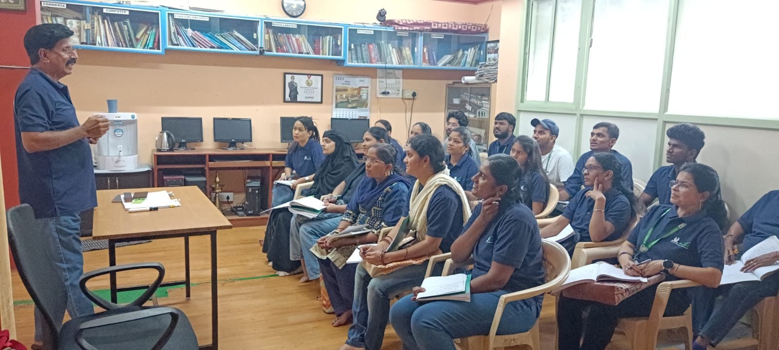 Trainer teaching a batch of learners at Nile